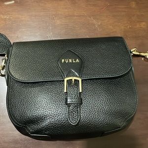 Furla crossbody with thick strap with dust bag.